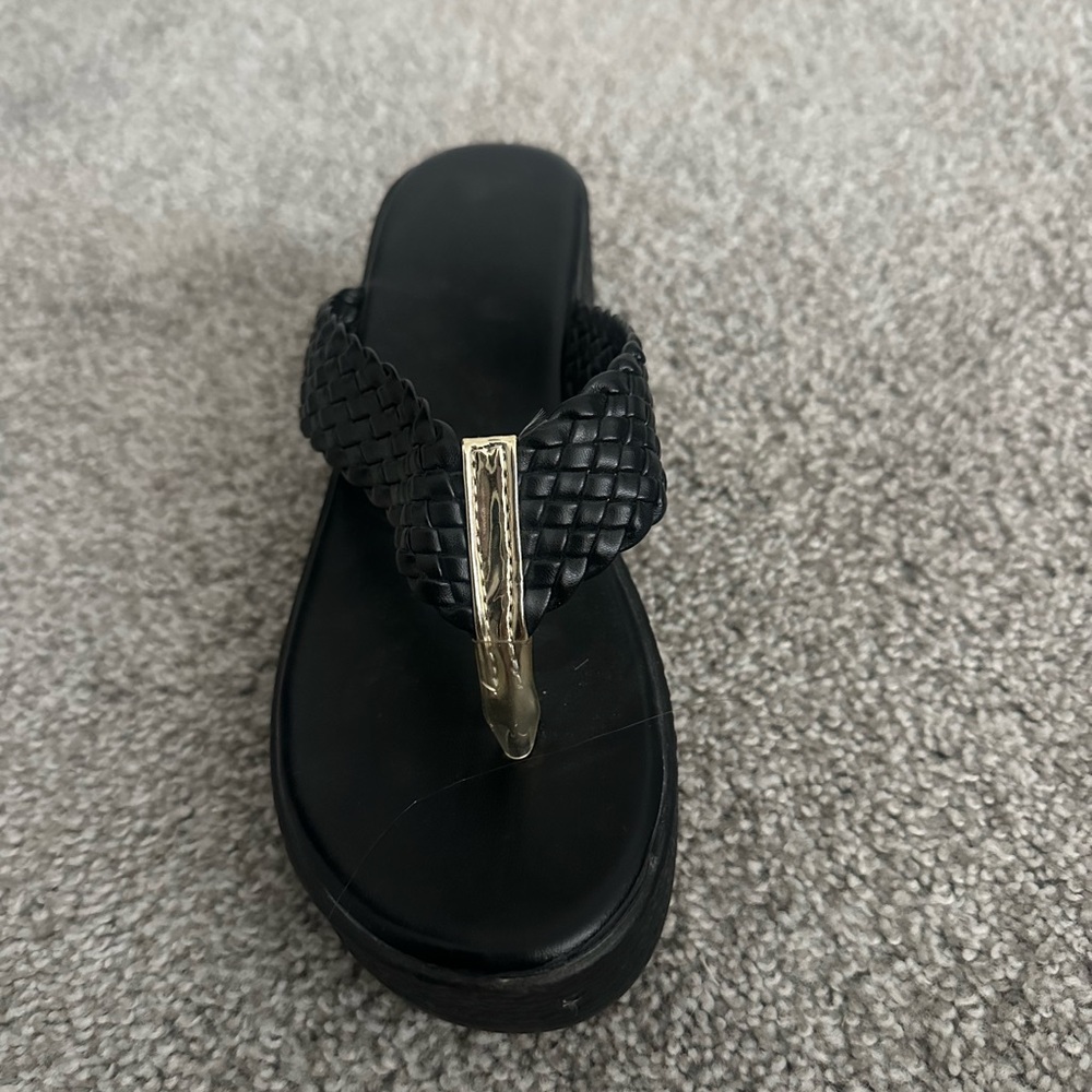 Chic Black Woven Sandals with Gold Accent